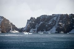 02B Steep Cliffs Guard The Neptunes Bellows Narrow Opening To Deception Island On Quark Expeditions Antarctica Cruise Ship.jpg